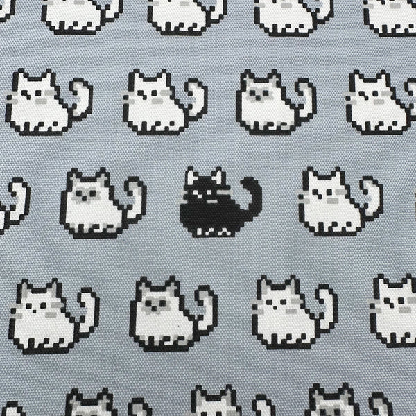 Scale of Pixel Cats gray cotton oxford fabric featuring a repeating pattern of pixel-style cat motifs arranged in rows.