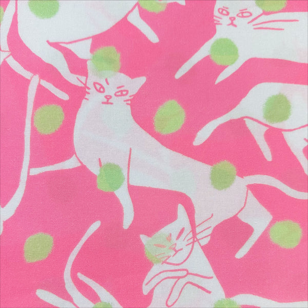 Close up of Polka Dot Cat Cotton Fabric in Pink by Nora – quilt-weight cotton with sketched cats and scattered polka dots, imported from Japan