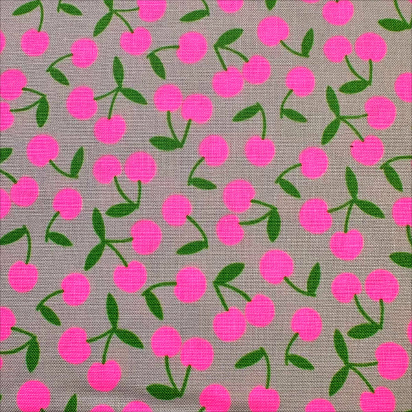 Close up of Pop Cherry cotton fabric with neon pink and gray cherries, Japanese Import, quilt weight cotton for sewing and quilting