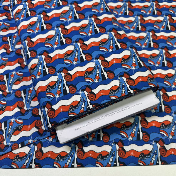 Bolt of Pop Stars Disco Stars Cotton Fabric by Cloud 9 Fabrics, red white and blue retro rollerskate print.