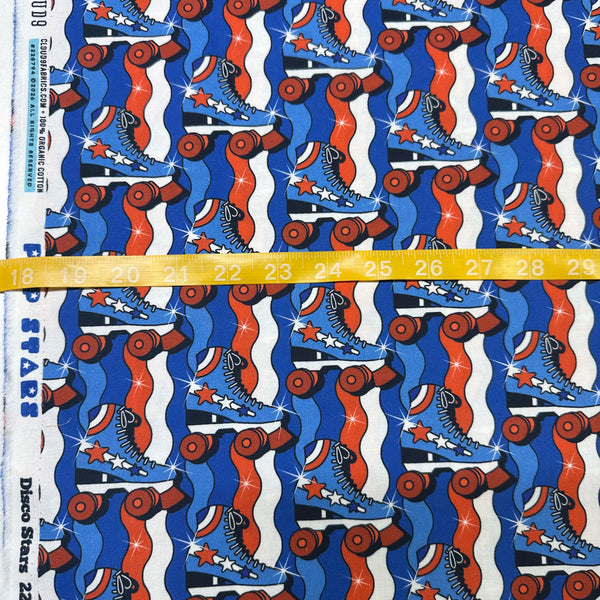 Scale of Pop Stars Disco Stars Cotton Fabric by Cloud 9 Fabrics, red white and blue retro rollerskate print.