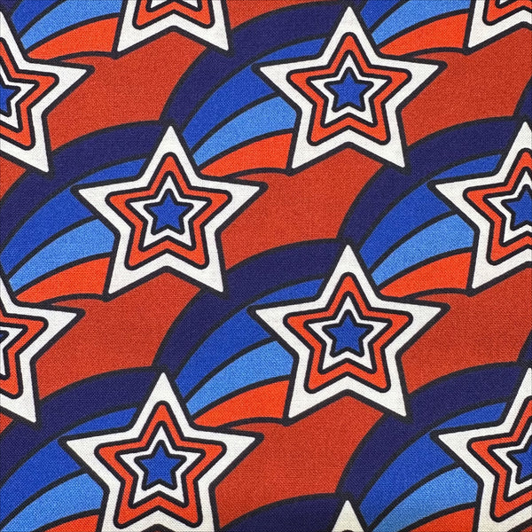 Close up of Pop Stars Groovy Stars Cotton Fabric by Cloud 9 Fabrics, retro red white and blue star print.