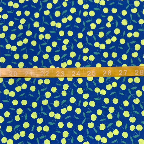 Scale of Pop Cherry Cotton Fabric in Navy and Neon Yellow featuring a bold cherry print, imported from Japan.