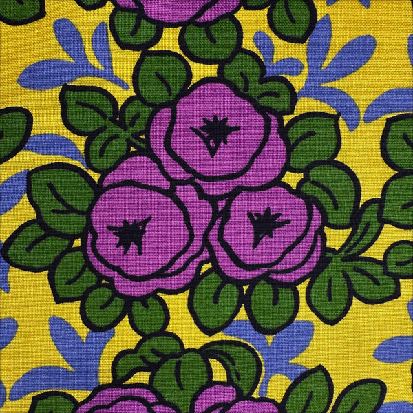 Close up of Pottery Rose Cotton Canvas Fabric by Cotton Kobayashi, style UP-9001 C, featuring Scandinavian rose bunches, in purple, imported from Japan