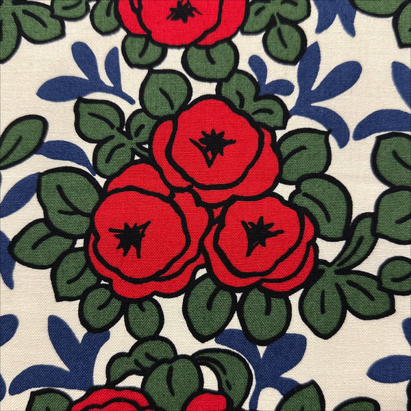 Close up of Pottery Rose Cotton Canvas Fabric by Cotton Kobayashi, style UP9001, featuring Scandinavian rose bunches, in red, imported from Japan