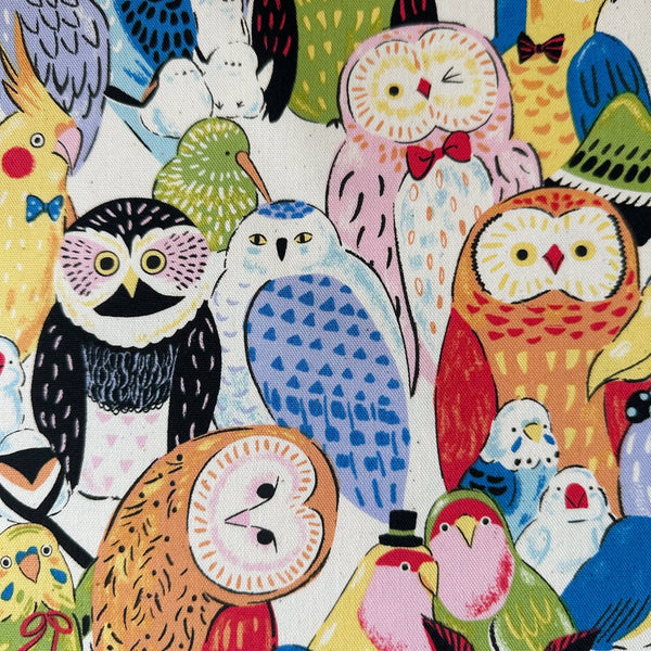 Close up of Powerful Animal Birds cotton oxford fabric by Kokka in natural, style YGA-81050-2A