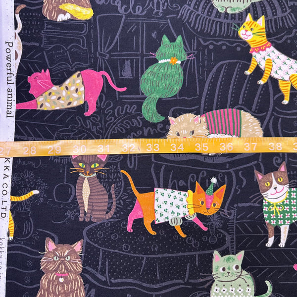 Scale of Powerful Animal Cats Cotton Oxford Fabric by Kokka Japan, featuring bold cat illustrations on mid-weight black cotton