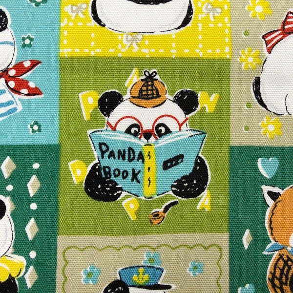 Close up of Powerful Animal Panda cotton oxford fabric by Kokka in green, YGA-96010-2B