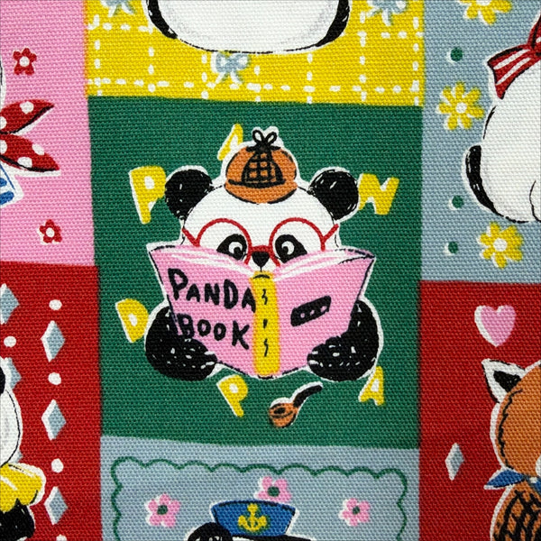 Close up of Powerful Animal Panda cotton oxford fabric by Kokka in red multi, YGA-96010-2A