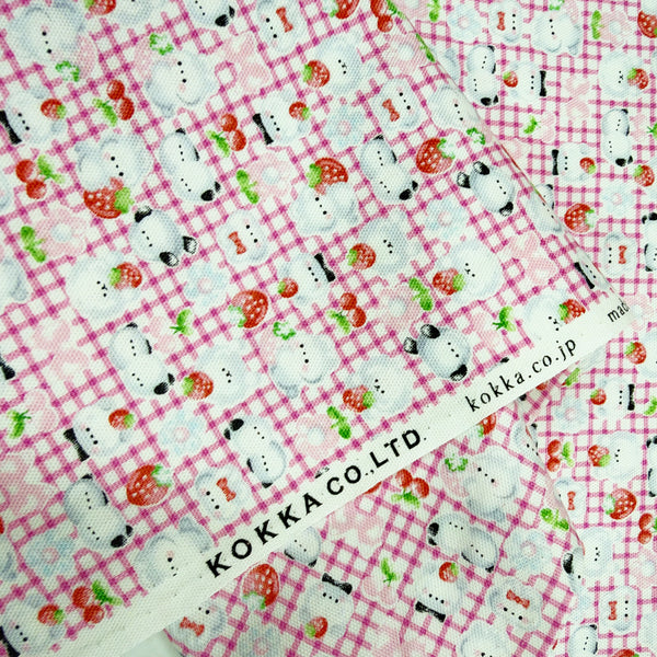 Selvage of Puchi Parade Bird Check cotton oxford fabric by Kokka in pink and white, YKA-46000-2A