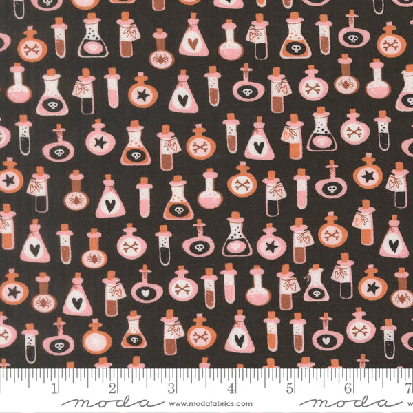 Scale of Purrs and Boos Poisons cotton fabric by Elena Amo for Moda featuring cute potion bottles on a black background