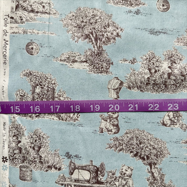 Scale of Rabbit Toile de Jouy cotton fabric in blue