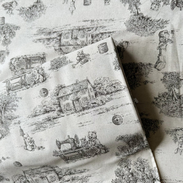 Bolt of Rabbit Toile de Jouy cotton fabric in natural