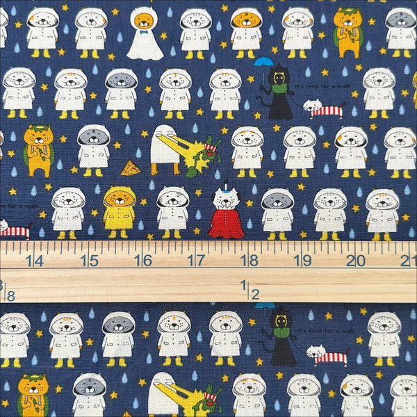 Scale of Raincoat Cats Cotton Canvas fabric by Cotton Kobayashi, style KTS-7194D, in navy