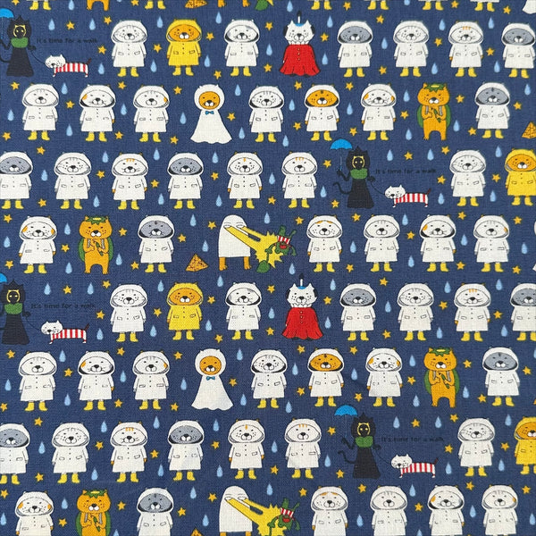 Raincoat Cats Cotton Canvas fabric by Cotton Kobayashi, style KTS-7194D, in navy