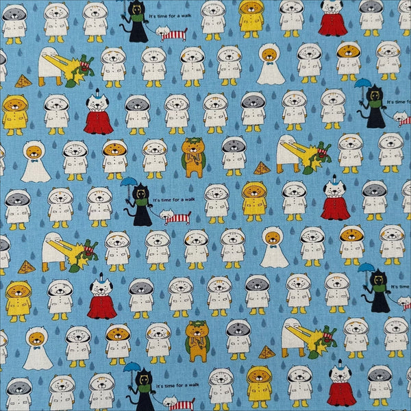 Raincoat Cats cotton canvas fabric by Cotton Kobayashi in sky blue