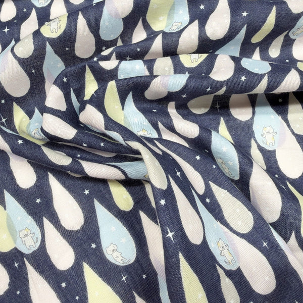 Drape of Raindrop Cats cotton double gauze fabric by Cotton Kobayashi in navy and multicolor