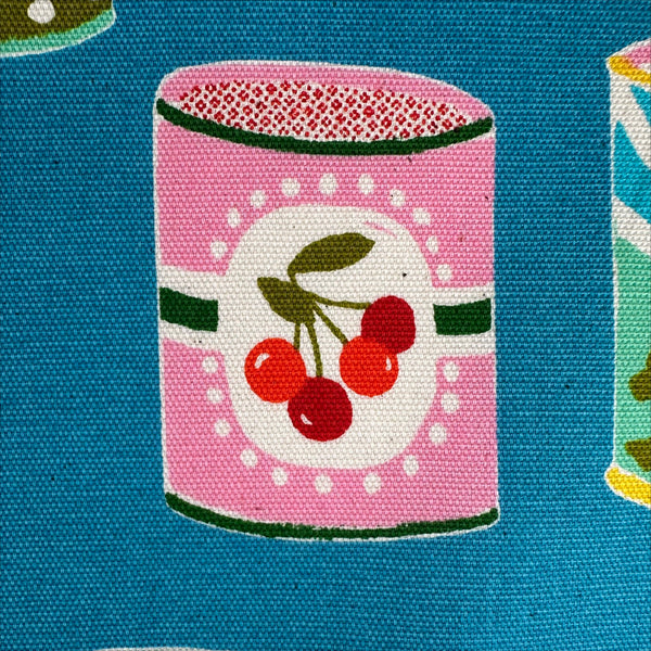 Close up of Retro Cans cotton oxford fabric by Sevenberry in teal, style 850607
