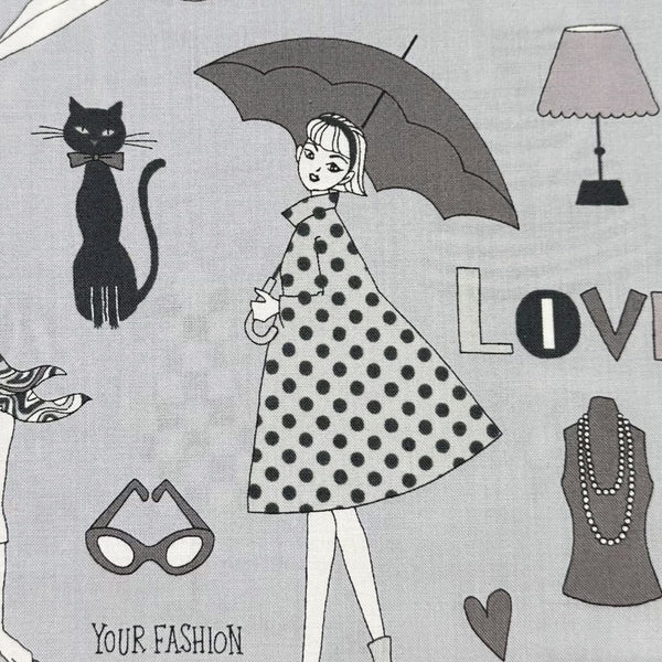 Close up of Retro Fashionistas cotton fabric in gray featuring 1960s-era fashion ladies by Miyako Kawaguchi for Kei Fabrics