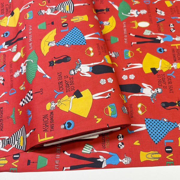 Bolt of Retro Fashionistas cotton fabric in red featuring 1960s-era fashion ladies by Miyako Kawaguchi for Kei Fabrics