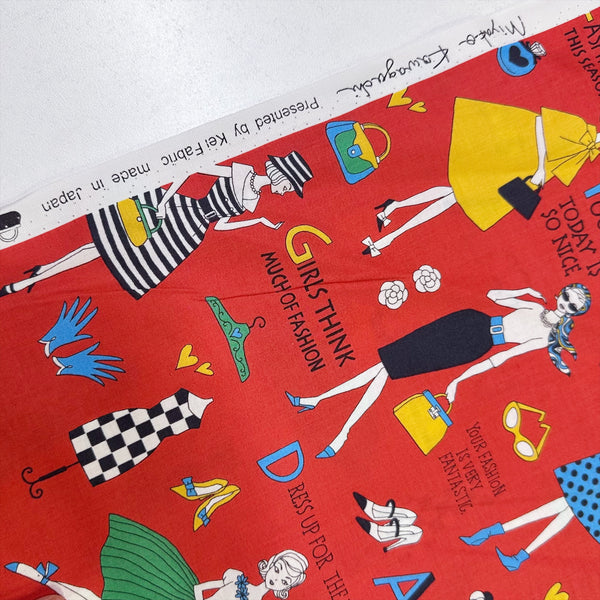 Selvage of Retro Fashionistas cotton fabric in red featuring 1960s-era fashion ladies by Miyako Kawaguchi for Kei Fabrics