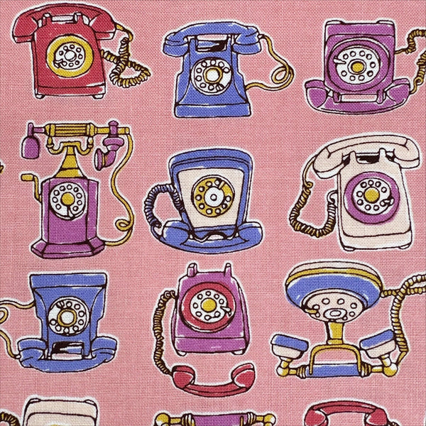 Close up of Retro Telephones cotton fabric by Cosmo Textiles in pink, AP65904 2B
