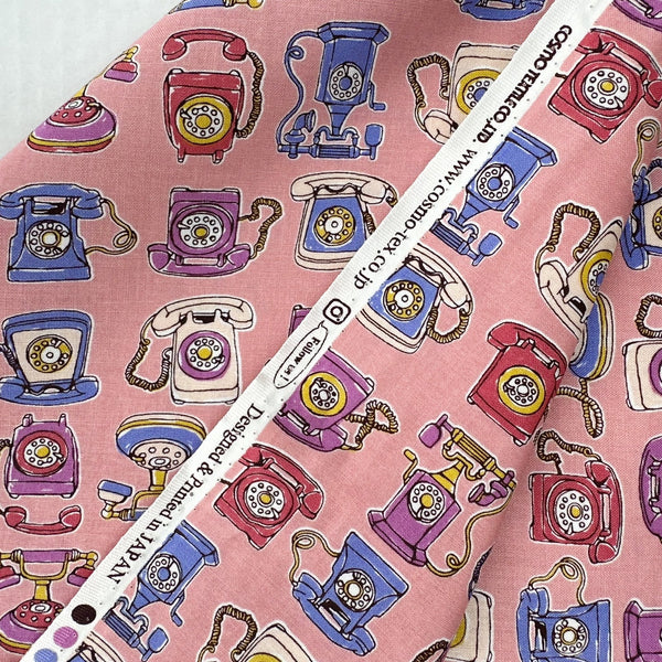 Selvage of Retro Telephones cotton fabric by Cosmo Textiles in pink, AP65904 2B