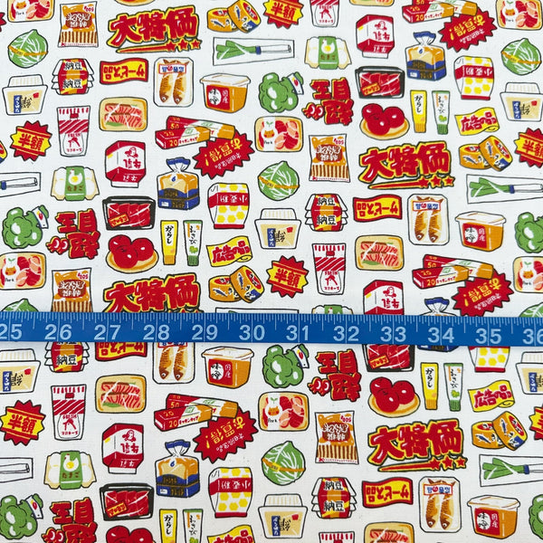 Scale of Retro Japanese Grocery cotton Oxford fabric by Cosmo Textiles featuring vintage-inspired Japanese food packaging and grocery motifs on a natural background
