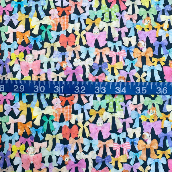 Scale of Ribbon Collector Cotton Lawn Fabric in Navy by Yukiemon for Hokkoh featuring whimsical ribbons and charming illustrated motifs on soft Japanese cotton lawn.
