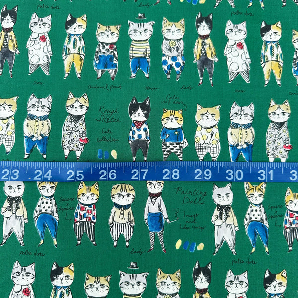 Scale of Rough Sketch Cat Cotton fabric by Yuwa Fabrics, style SK829981-G, in green