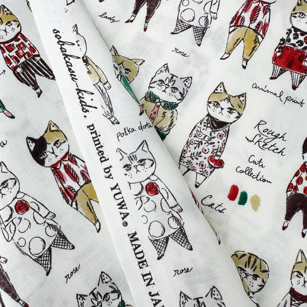 Selvage of Rough Sketch Cat Cotton Fabric by Sobakasu-Kids for YUWA Fabrics featuring dapper cats wearing hats and ties on white Japanese cotton fabric