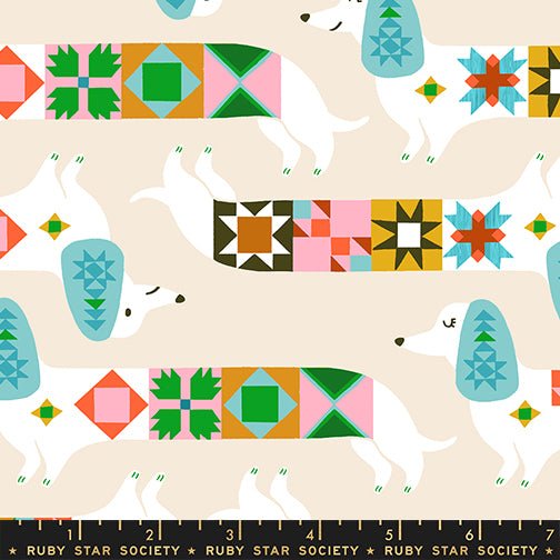 Quilty Dog fabric by Ruby Star Society shown with scale reference