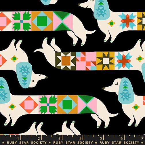 Quilty Dog fabric by Ruby Star Society shown with scale reference