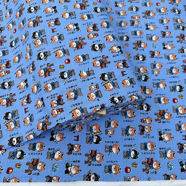 Bolt of Samurai Dogs Cotton Dobby Fabric in Blue by Cosmo Textiles Imported from Japan