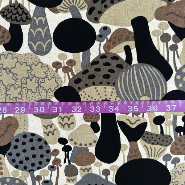Scale of Scandi Mushrooms Cotton Linen Canvas Fabric by Cotton Kobayashi, style UP-9014 B, featuring Scandinavian mushrooms, in brown and gray, imported from Japan