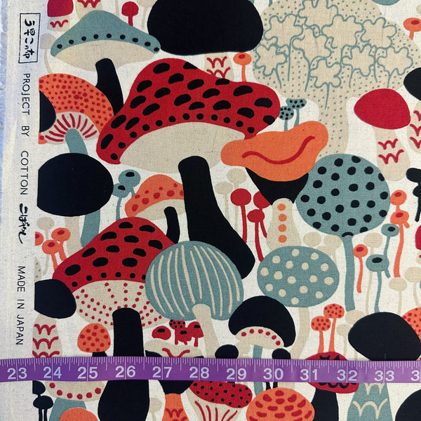 Scale of Scandi Mushrooms Cotton Linen Canvas Fabric by Cotton Kobayashi, style UP-9014A, featuring Scandinavian mushrooms, in natural and multi, imported from Japan