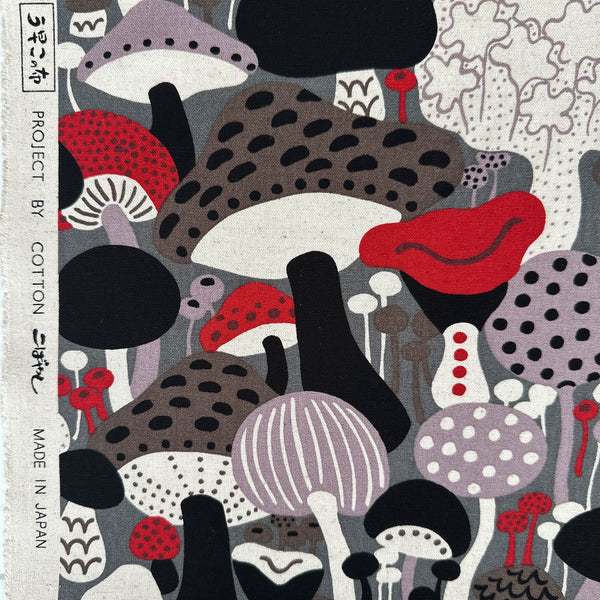 Selvage of Scandi Mushrooms Cotton Linen Canvas Fabric by Cotton Kobayashi, style UP-9014C, featuring Scandinavian mushrooms, in gray and multi, imported from Japan