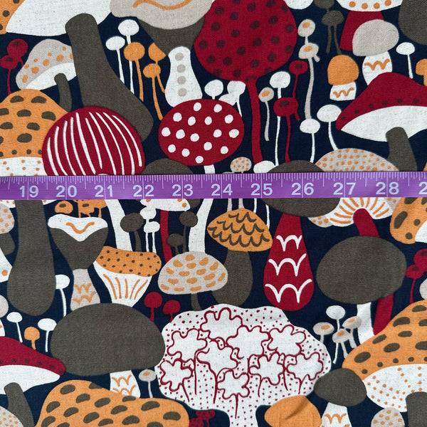 Scale of Scandi Mushrooms Cotton Linen Canvas Fabric by Cotton Kobayashi, style UP-9014D, featuring Scandinavian mushrooms, in navy and orange, imported from Japan
