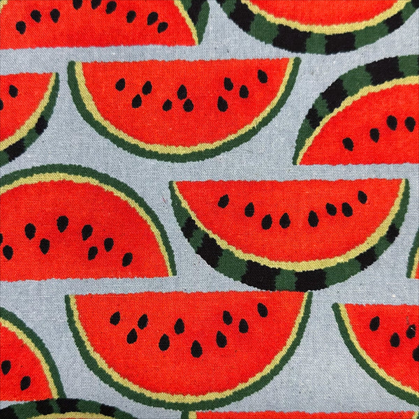 Close up of Red Watermelons on Gray cotton linen canvas fabric by Sevenberry, Japanese import with watermelon print on gray background
