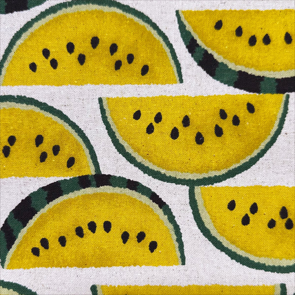 Close up of Yellow Watermelons on Natural cotton linen canvas fabric by Sevenberry, Japanese import with watermelon print on natural background