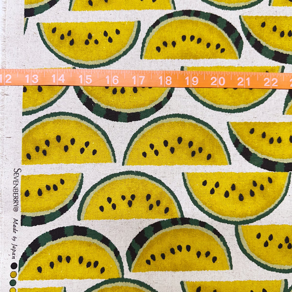 Scale of Yellow Watermelons on Natural cotton linen canvas fabric by Sevenberry, Japanese import with watermelon print on natural background