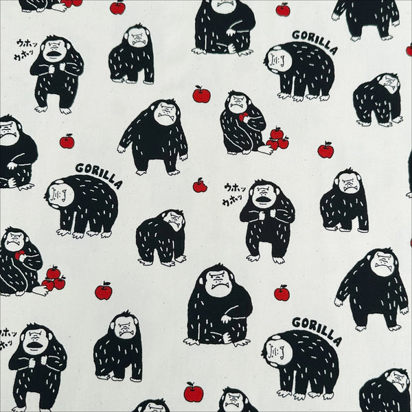Silly Gorilla Cotton Oxford Fabric in White by Cosmo Textiles featuring animated gorillas and apples on a white background.