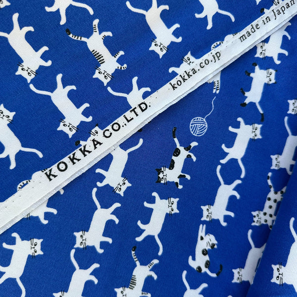 Selvage of Simply Palette Cats Cotton Oxford fabric by Kokka, style YPA-69010-1 E, in blue and white