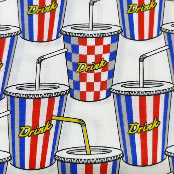 Close up of Soda Drink cotton broadcloth fabric in white by Sevenberry, Japanese import featuring retro pop art soda cup print