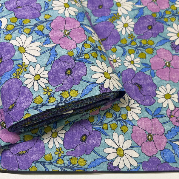 Bolt of Sopo Retro Vintage Floral Cotton Dobby Fabric in Blue by Kokka Japanese import with rustic floral print and textured dobby weave