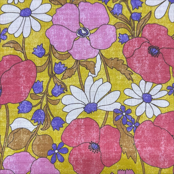 Close up of Sopo Retro Vintage Floral Cotton Dobby Fabric in Mustard by Kokka Japanese import with rustic floral print and textured dobby weave