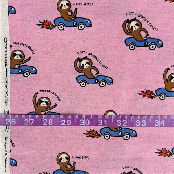 Scale of Speedy Sloth Cotton Linen Blend Fabric by Cosmo Textiles, style AP65204 2B, featuring sloths in red racing cars, in pink