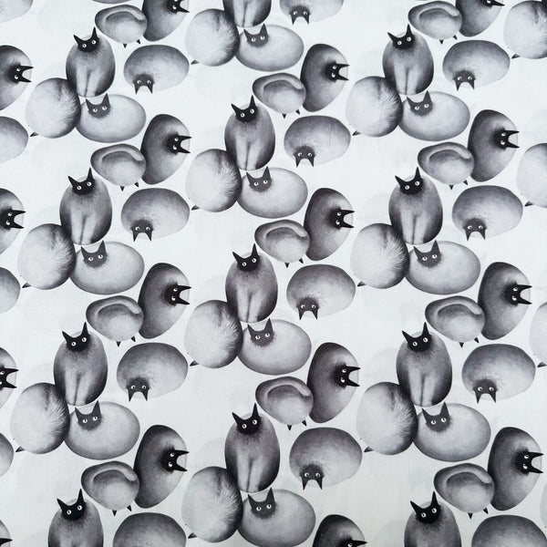 Stone Cats cotton fabric in Gray by Nora featuring round stone cats with a quirky, surreal charm and slightly eerie appeal
