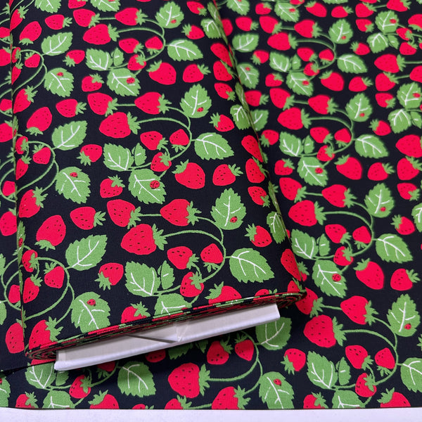 Bolt of Strawberries Vines cotton oxford fabric in black by Sevenberry, Japanese import featuring strawberry and vine print