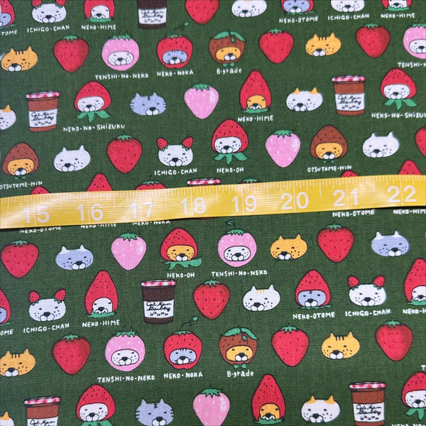 Scale of Strawberry Cats canvas fabric by Cotton Kobayashi, cotton linen blend with playful cats dressed as strawberries